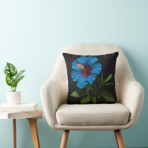 "Radiant Blue: Hibiscus Flower Against On Black  Cushion