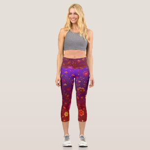 Radiant Wildflowers: Glowing Orange and Purple on Capri Leggings