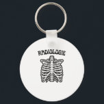 Radiologie Rib Cage Skeleton Illustration Key Ring<br><div class="desc">This bold black-and-white design features a detailed rib cage skeleton with “Radiologie” typography,  blending medical precision with vintage style. Perfect for radiology professionals,  students,  and anatomy enthusiasts,  it captures the essence of imaging science in a clean,  striking aesthetic. Ideal for those passionate about medical fields and human anatomy art.</div>