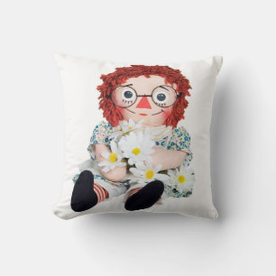 rag doll with daisy bouquet cushion