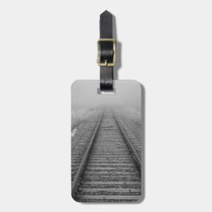 railroad tracks fade into the morning fog luggage tag