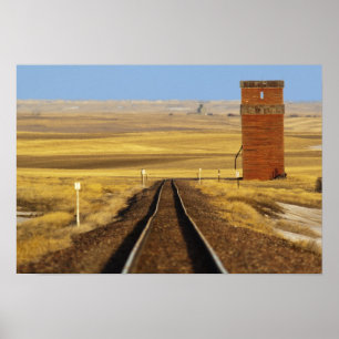 Railroad tracks lead to old granary at Collins Poster