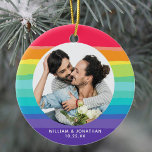 Rainbow Gay Couple Photo Ceramic Ornament<br><div class="desc">Show off your love with this beautiful commemorative gay wedding Christmas ornament. A colourful rainbow surrounds the happy LGBTQ couple. Add the newlywed names and anniversary date on the pretty purple colour.</div>