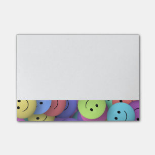 Rainbow of Colourful Happy Faces Post-it Notes