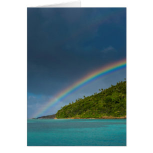 Rainbow over island, American Samoa
