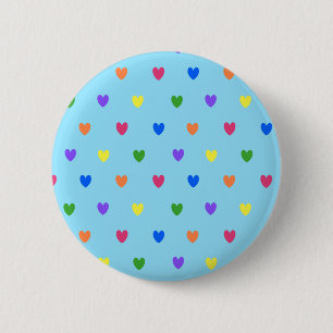 Rainbow polka hearts on baby blue 6 cm round badge