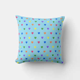 Rainbow polka hearts on baby blue cushion