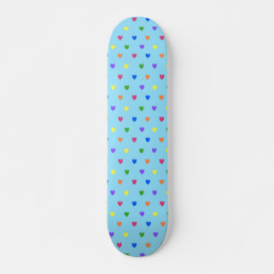 Rainbow polka hearts on baby blue skateboard