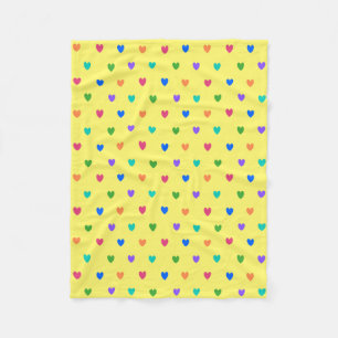 Rainbow polka hearts on yellow fleece blanket