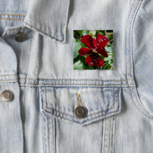 Raindrops on pansy 15 cm square badge