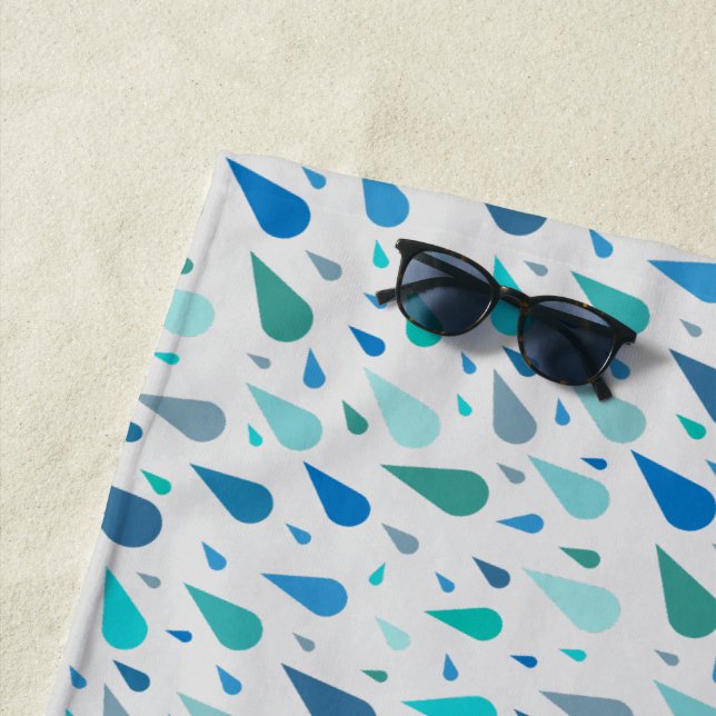 Rainy day pattern with blue raindrops beach towel (In Situ)