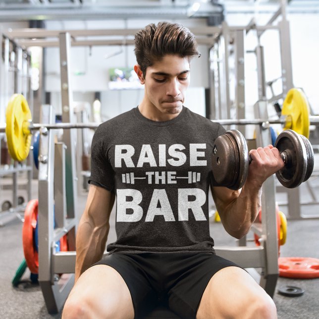 Raise The Bar T-Shirt (Fitness freak working hard at gym.)
