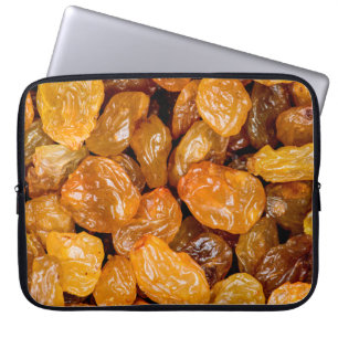 Raisins close up photo texture background. laptop sleeve