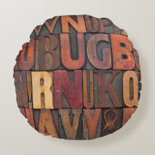 random alphabet letters - vintage letterpress wood round cushion