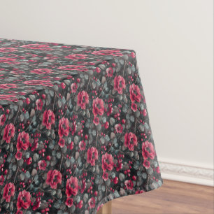Raspberry, burgundy flowers on dark grey tablecloth