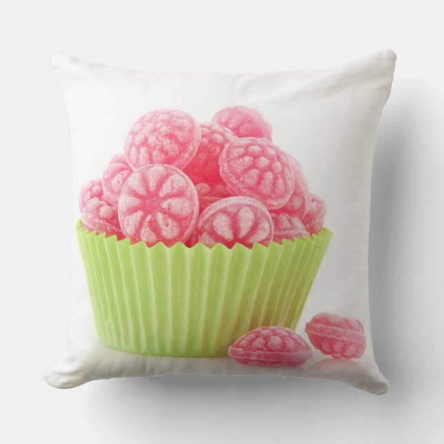 Raspberry tasty candy sweets in green cup cake cushion (Front)