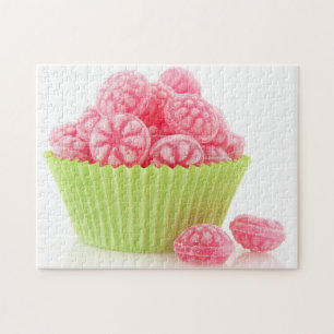 Raspberry tasty candy sweets in green cup cake jigsaw puzzle