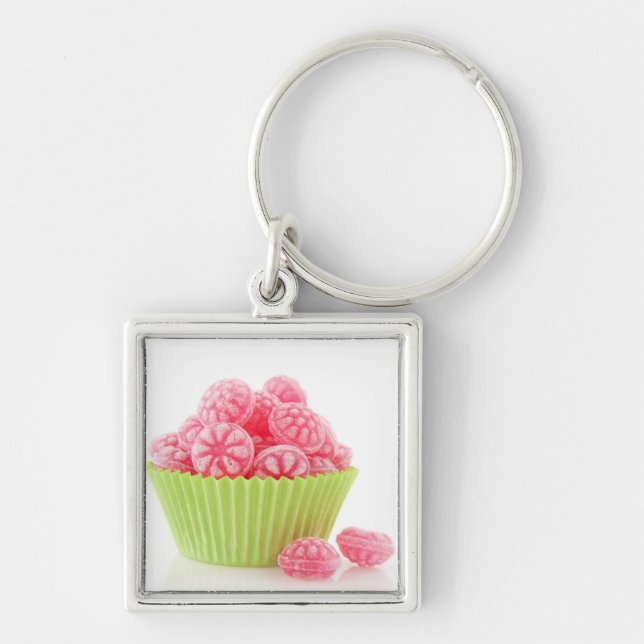 Raspberry tasty candy sweets in green cup cake key ring (Front)