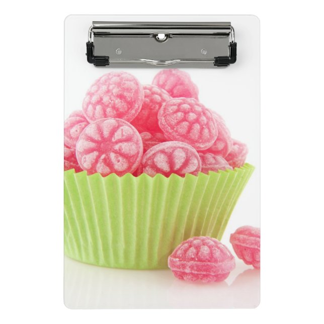 Raspberry tasty candy sweets in green cup cake mini clipboard (Front)