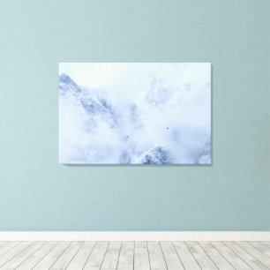 Ravens, snowy mountains and clouds canvas print