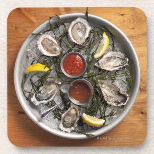 Raw oysters arranged coaster