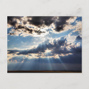 Rays of sunshine from above postcard