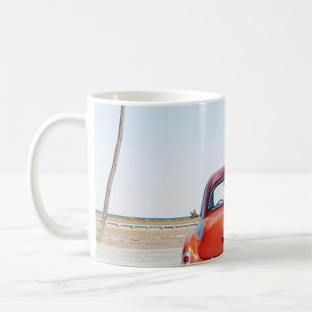 Re beetle beside coconut trees coffee mug (Left)