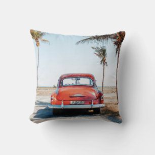 Re beetle beside coconut trees cushion