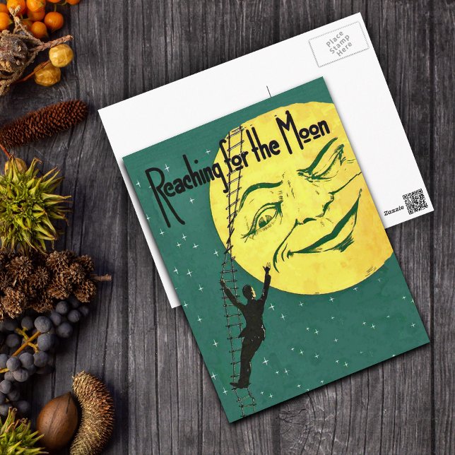 Reaching for the Moon Postcard (Man on ladder Reaching for big yellow moon with face on green postcard with white stars.)