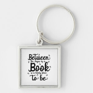 Reading Art Between The Paper Of A Book Key Ring