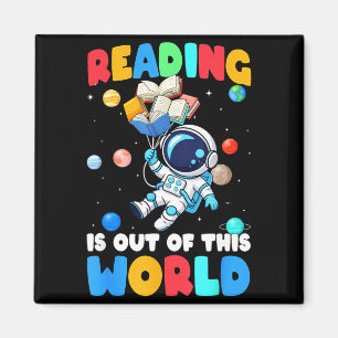 Reading is out of this world astronaut holding magnet