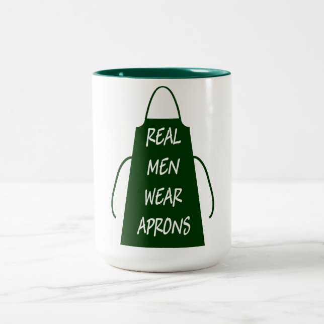 Real Men Wear Aprons (Green) Two-Tone Coffee Mug (Center)