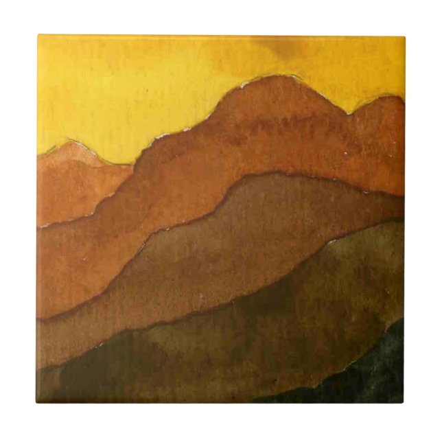 Receding mountain ranges with yellow sunrise sky ceramic tile (Front)