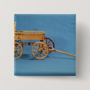 Reconstruction of a chariot found 15 cm square badge