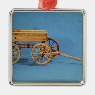 Reconstruction of a chariot found metal ornament