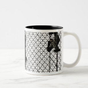 recruits completing an obstacle Two-Tone coffee mug