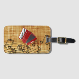 Red accordion, black notes, gold background luggag luggage tag