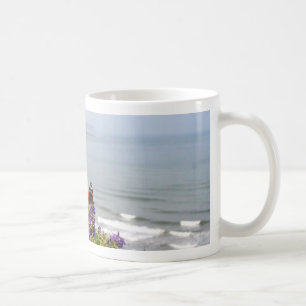 Red Admiral Butterfly On The Flower With A Sea In Coffee Mug