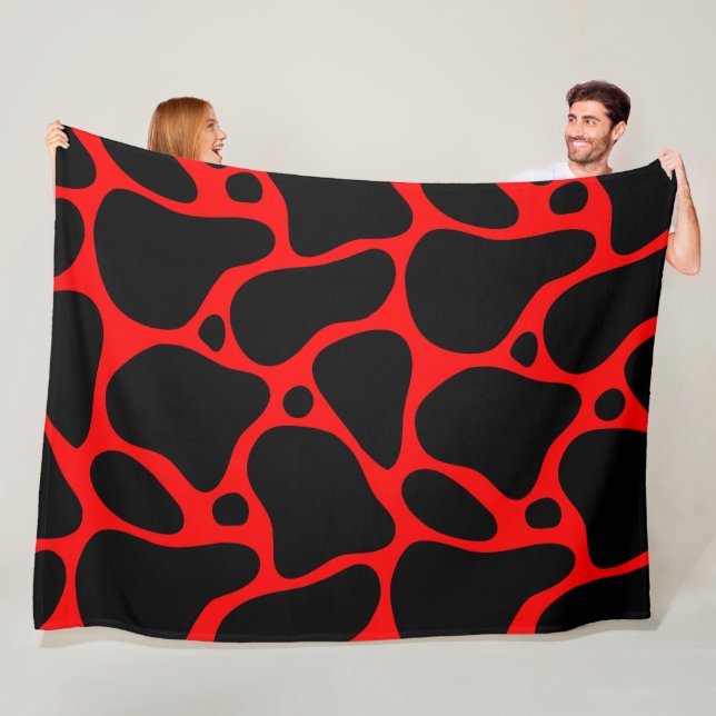 Red and black abstract giraffe pattern fleece blanket (In Situ)