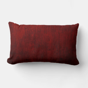 Red and black floral textile lumbar cushion