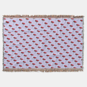 Red and blue poppy flower on lilac purple throw blanket
