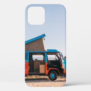 Red and blue vehicle beside man iPhone 12 case