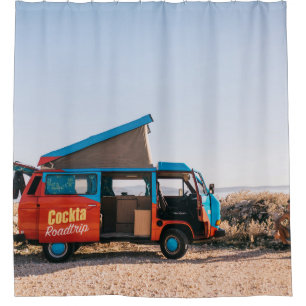 Red and blue vehicle beside man shower curtain