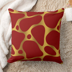 Red and gold abstract giraffe pattern throw pillow