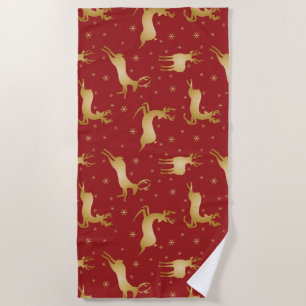 Red and gold Christmas reindeer Beach Towel