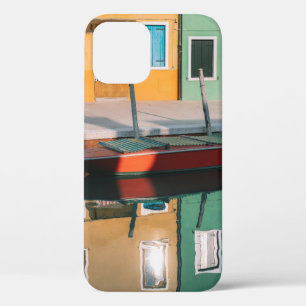 RED AND GREEN BOAT DOCKING ON DOCK iPhone 12 CASE