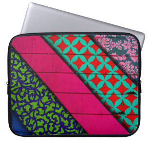 Red and green garment laptop sleeve