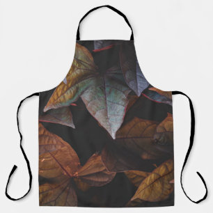 RED AND GREEN LEAVES ON BLACK BACKGROUND APRON