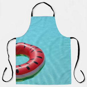Red and green lifebuoy on swimming pool apron