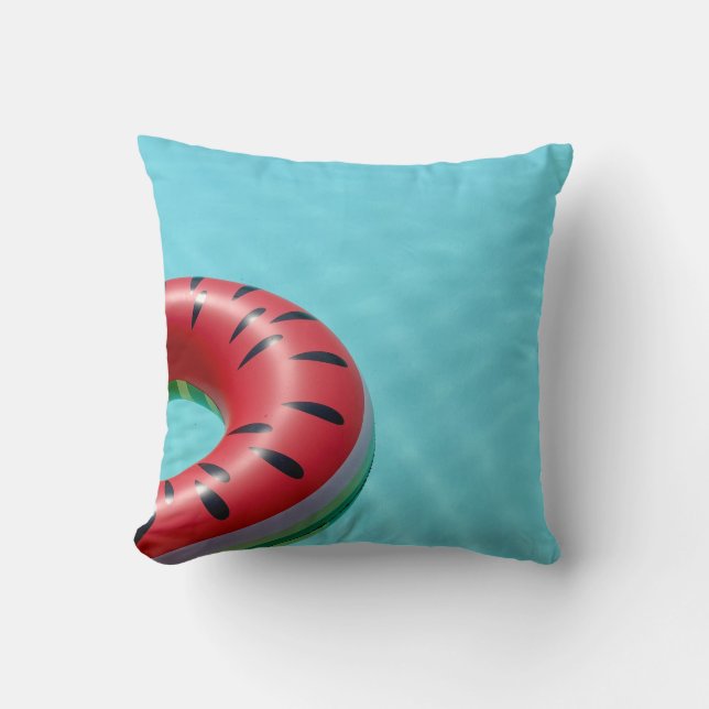 Red and green lifebuoy on swimming pool cushion (Front)
